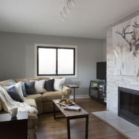 Never too many pillows! Sitting Room Redesign for Milwaukee Home