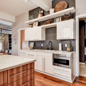Kitchen area with new custom backsplash Remodeled Kitchen with Custom Backsplash