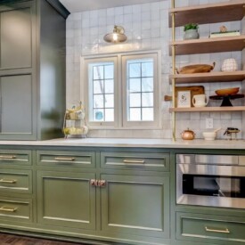 Expertly-designed brass front bar cabinets complete this kitchen area Kitchen Cabinet Layout Redesign
